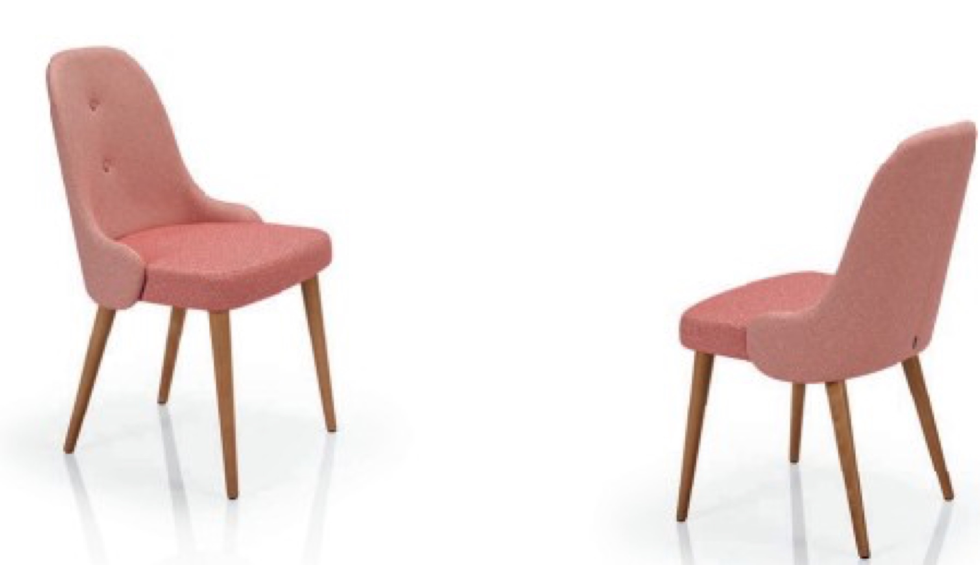 Cadeiras rosa estofadas com pernas de madeira